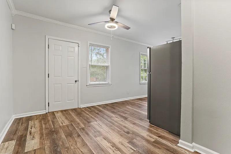 1268 Eastland Road Southeast, Unit B Atlanta, GA 30316 - Photo 4 of 20 wooden floor in an empty room with a window