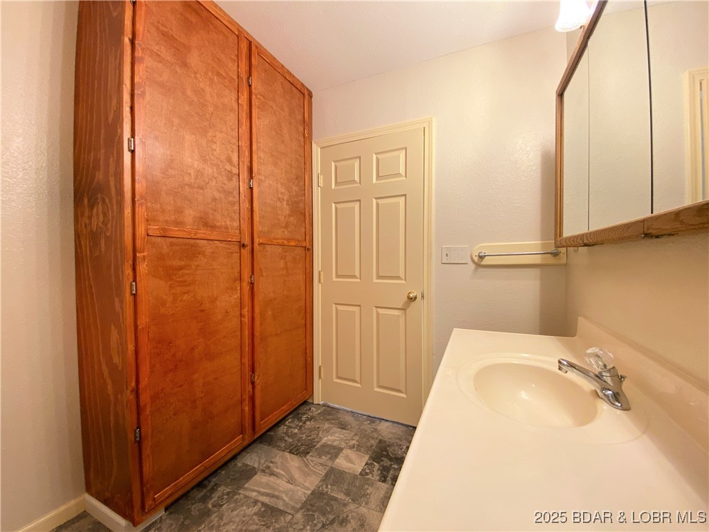 209 Two N Two Lane Camdenton, MO 65020 - Photo 29 of 66 storage in main bathroom