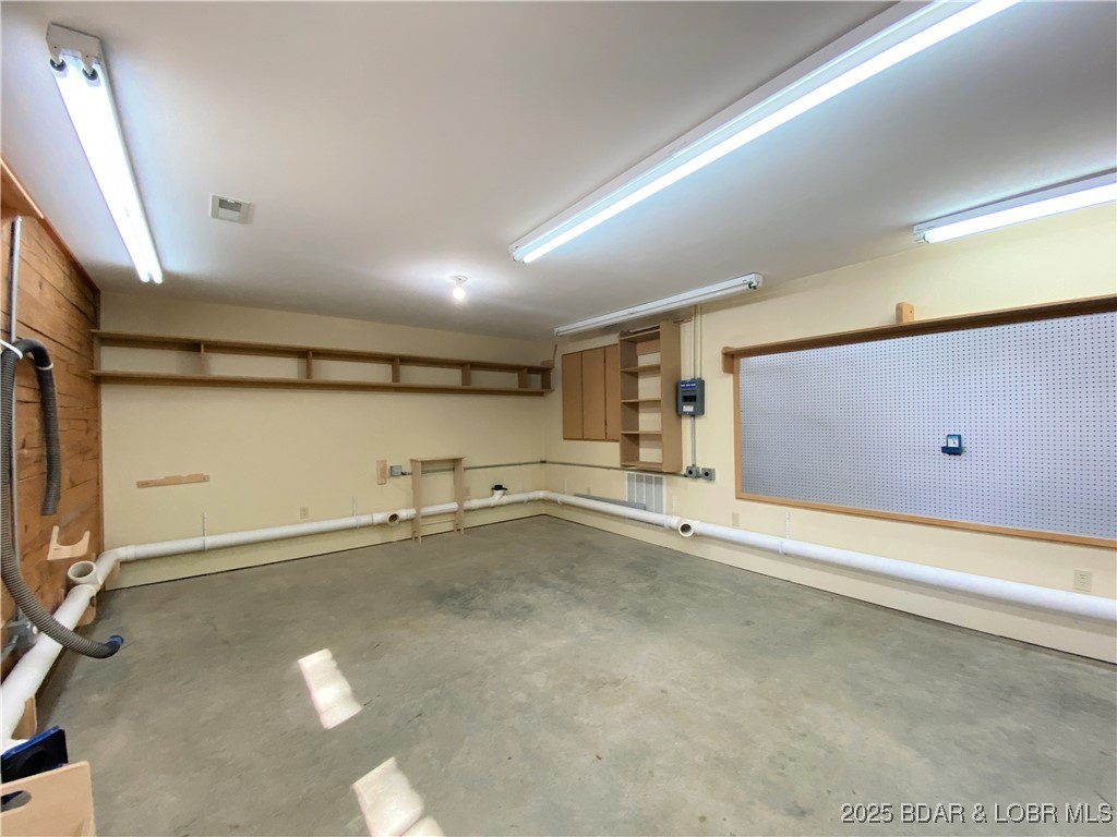 209 Two N Two Lane Camdenton, MO 65020 - Photo 38 of 66 work shop in basement