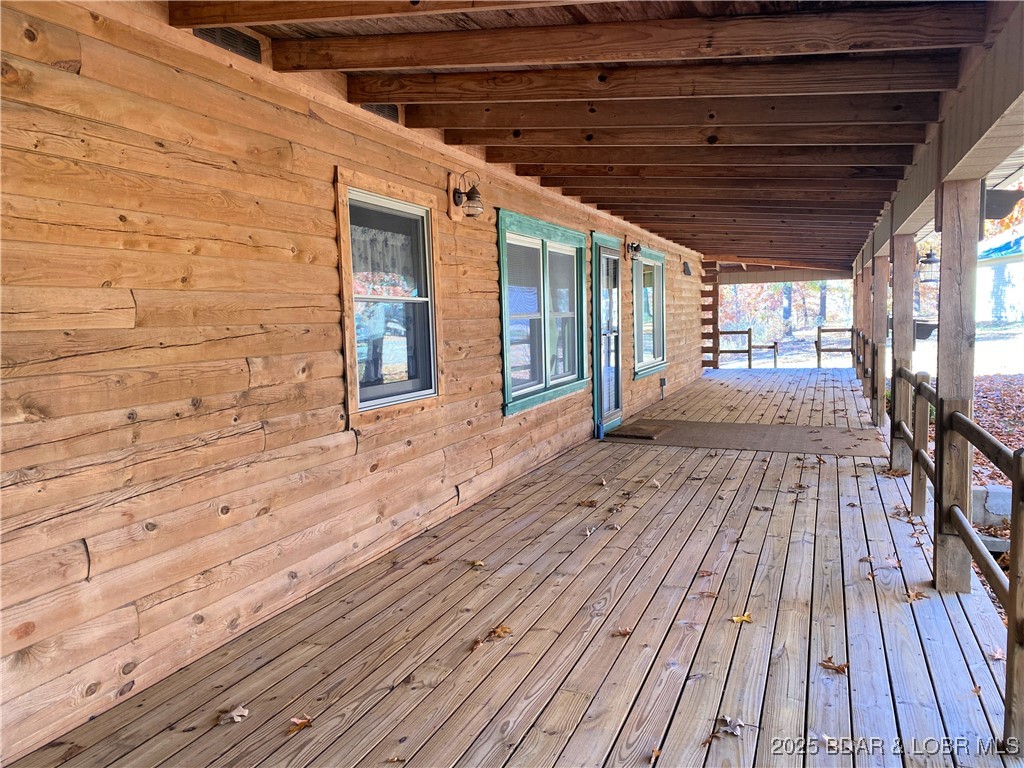 209 Two N Two Lane Camdenton, MO 65020 - Photo 4 of 66 front porch, does wrap around
