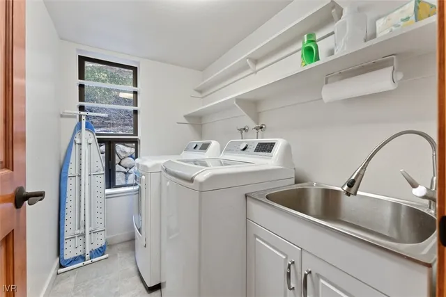 a utility room with dryer and washer