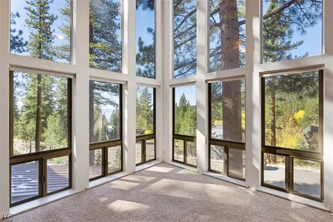 a view of a room with a large window