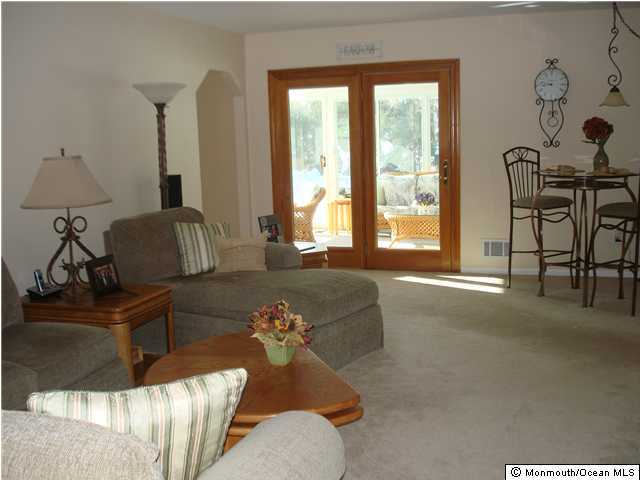 30 Pepperridge Road Howell, NJ 07731 - Photo 3 of 3 a living room with furniture and a large window