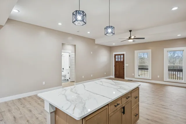 a view of a kitchen counter space a sink and dishwasher