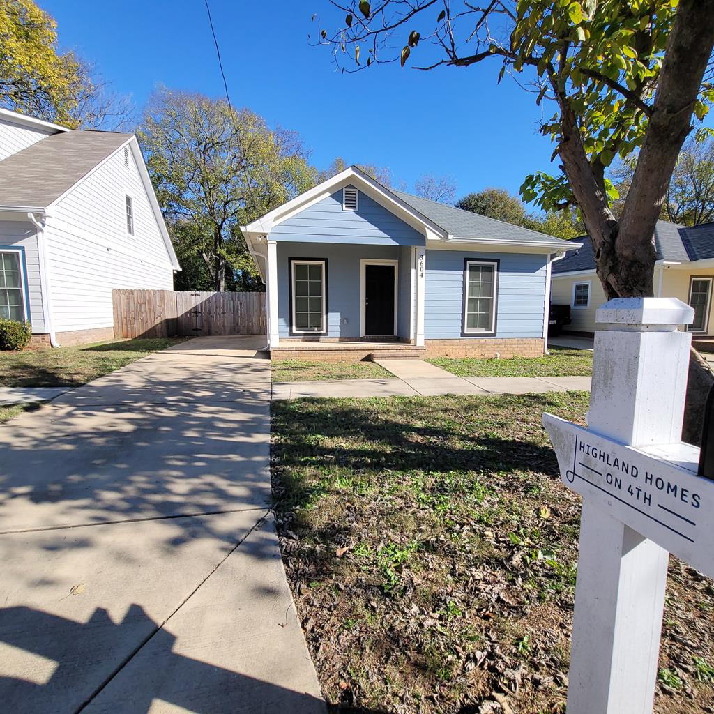 3604 4th Avenue Columbus, GA 31904 - Photo 1 of 19 a front view of a house with a yard