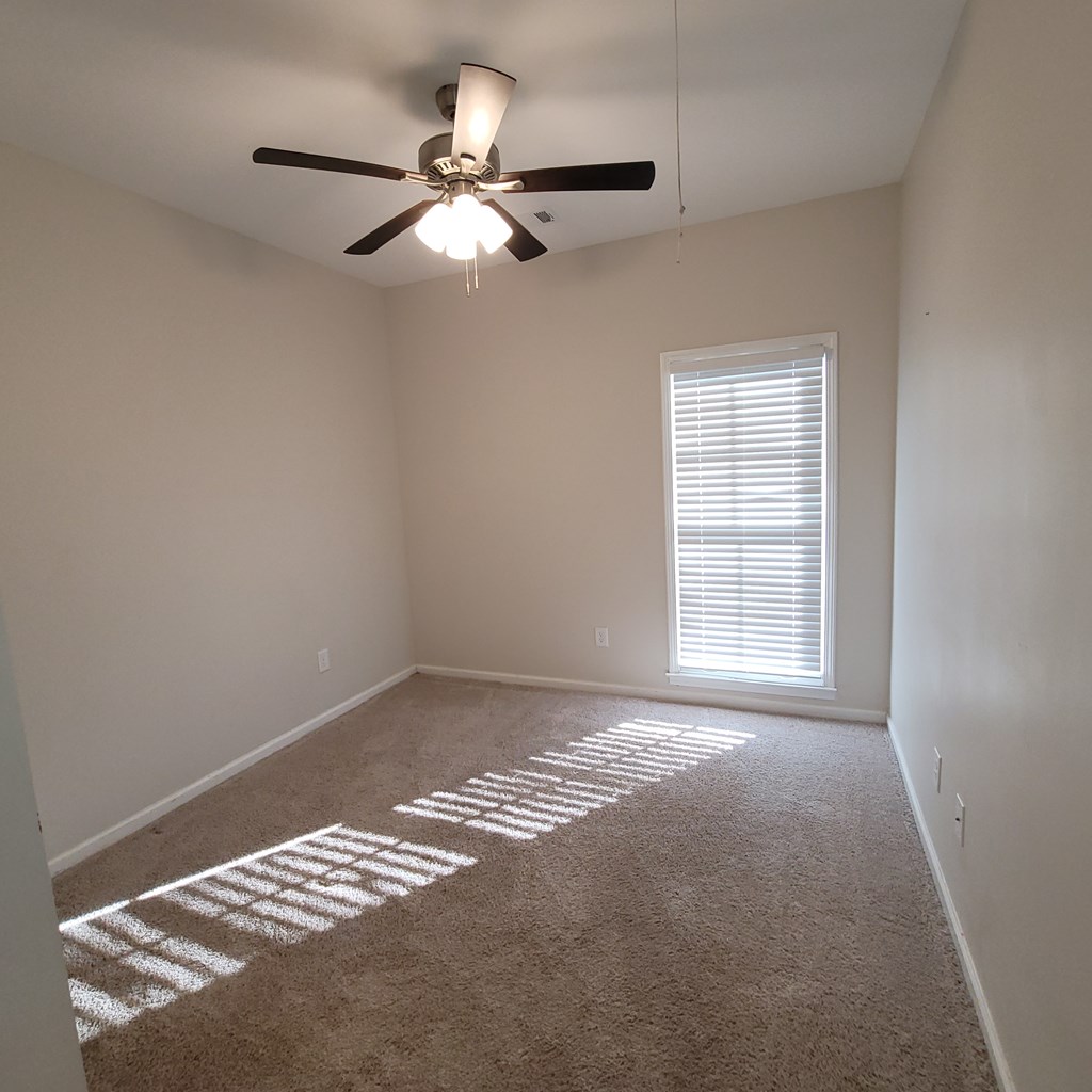 3604 4th Avenue Columbus, GA 31904 - Photo 11 of 19 a view of an empty room with a window
