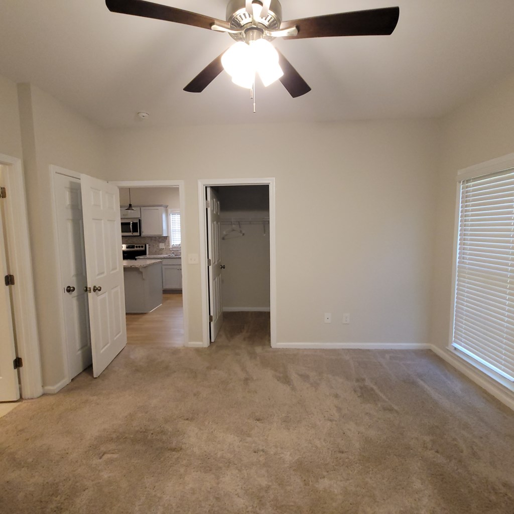 3604 4th Avenue Columbus, GA 31904 - Photo 14 of 19 a view of a kitchen with a sink and a ceiling fan