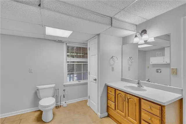 a view of backyard with a deck and wooden floor