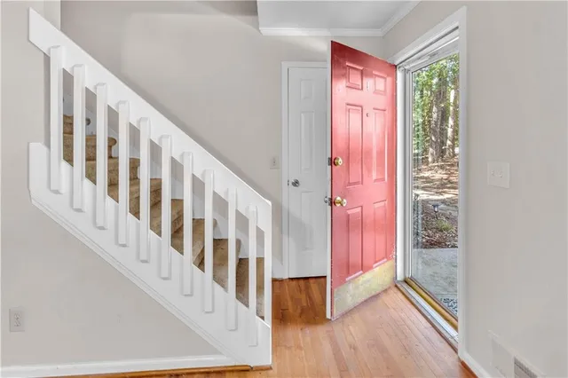 a view of a large window with wooden floor
