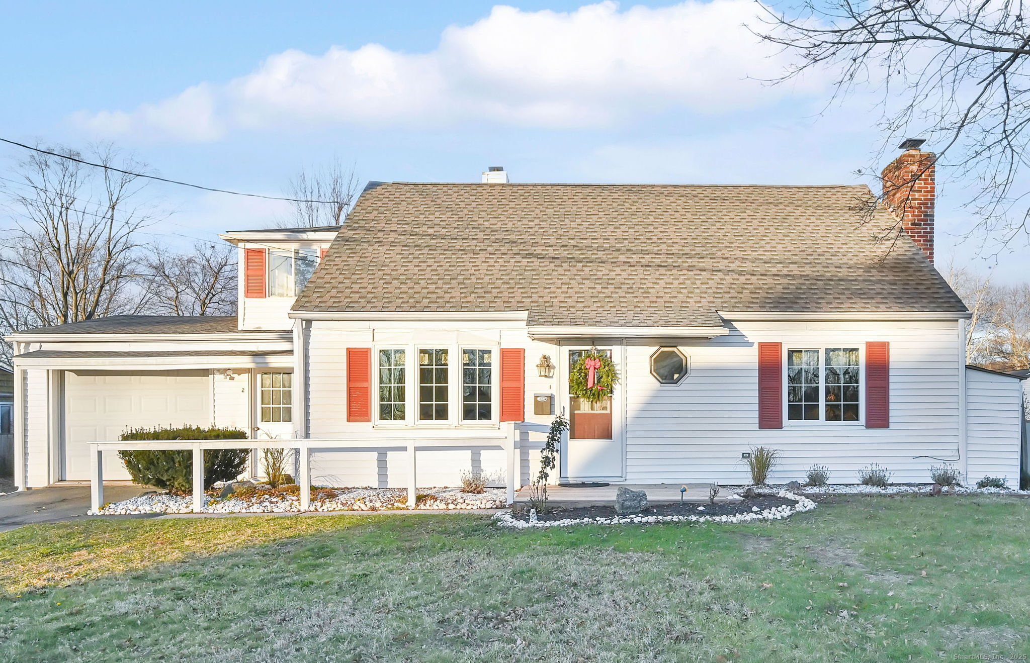 front view of house with a yard