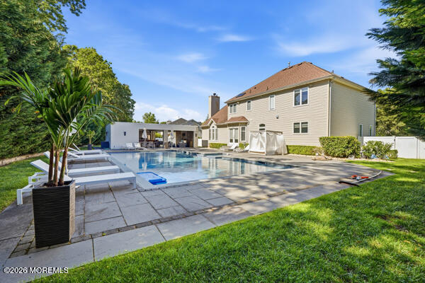 54 Georgetown Road Eatontown, NJ 07724 - Photo 17 of 24 a view of a backyard with sitting area