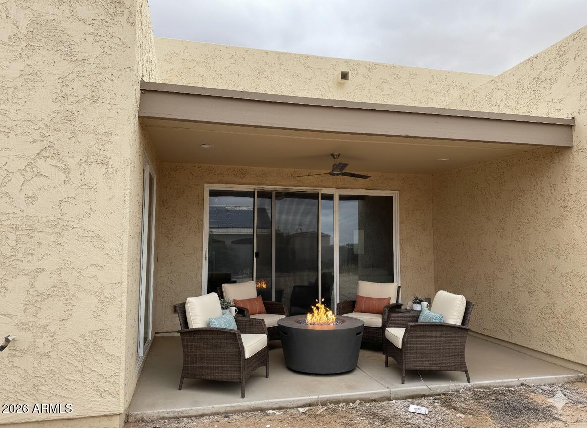 14825 Charco Road Arizona City, AZ 85123 - Photo 11 of 24 a living room with furniture and large window