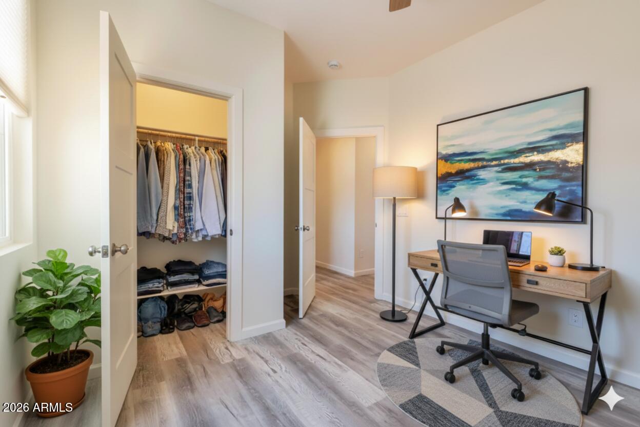 14825 Charco Road Arizona City, AZ 85123 - Photo 8 of 24 a workspace with furniture and a potted plant