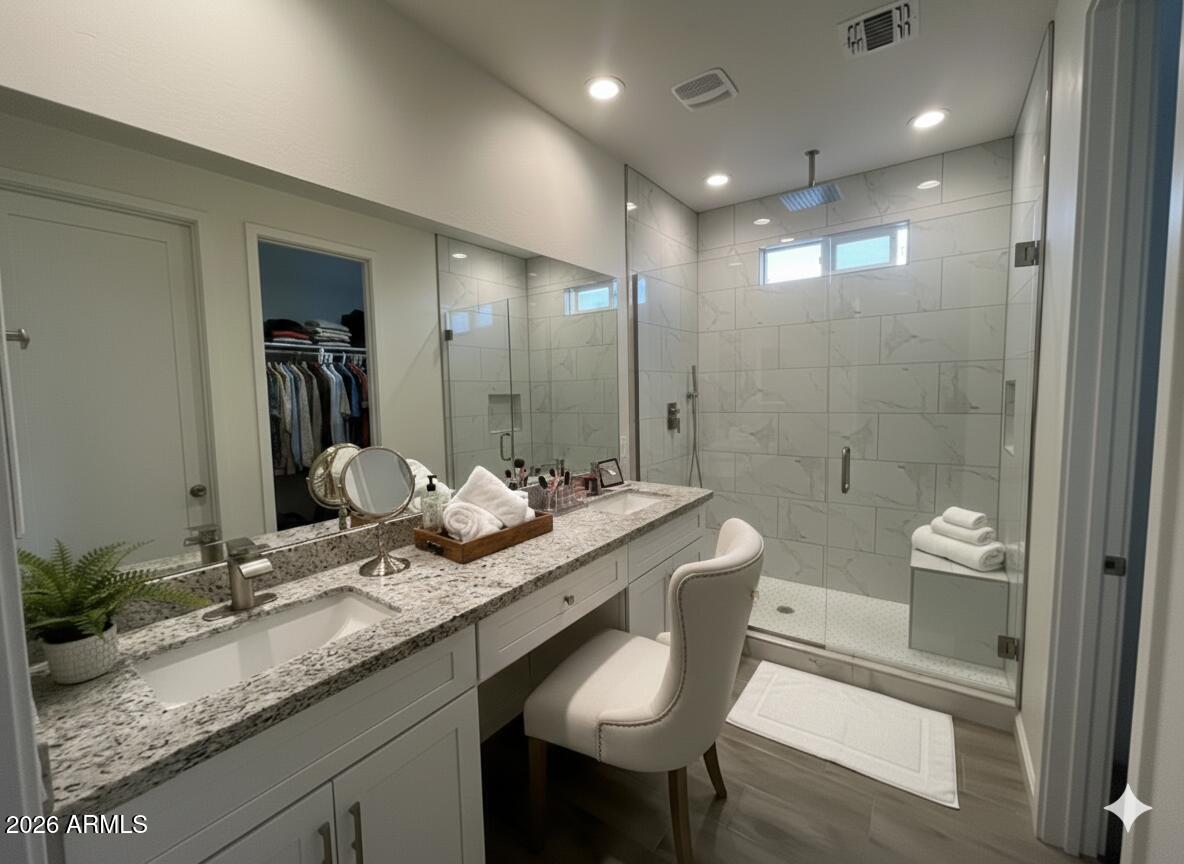 14825 Charco Road Arizona City, AZ 85123 - Photo 10 of 24 a bathroom with a granite countertop sink a toilet and shower