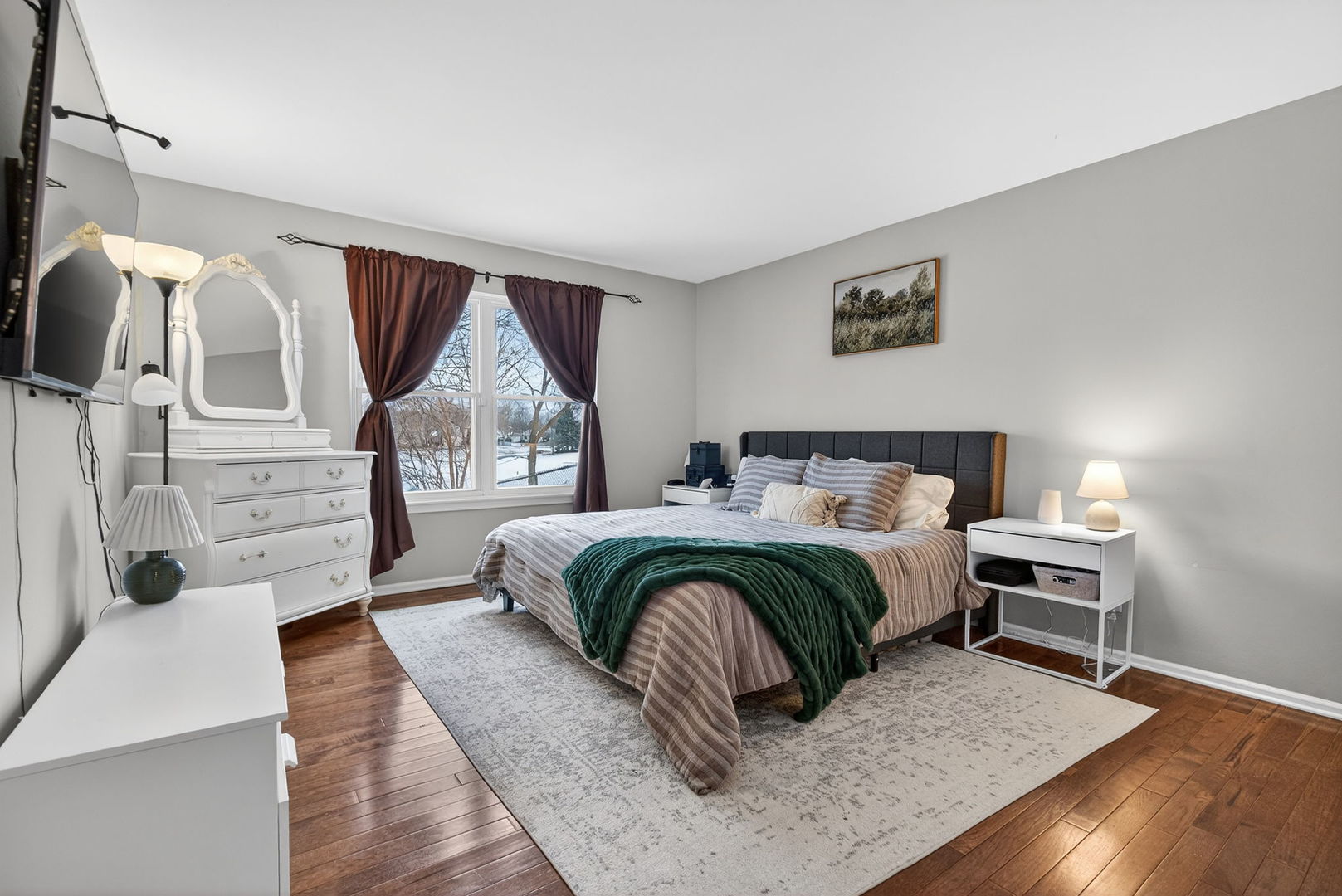 1412 Bar Harbour Road Aurora, IL 60504 - Photo 19 of 38 a bedroom with a bed a mirror and a window