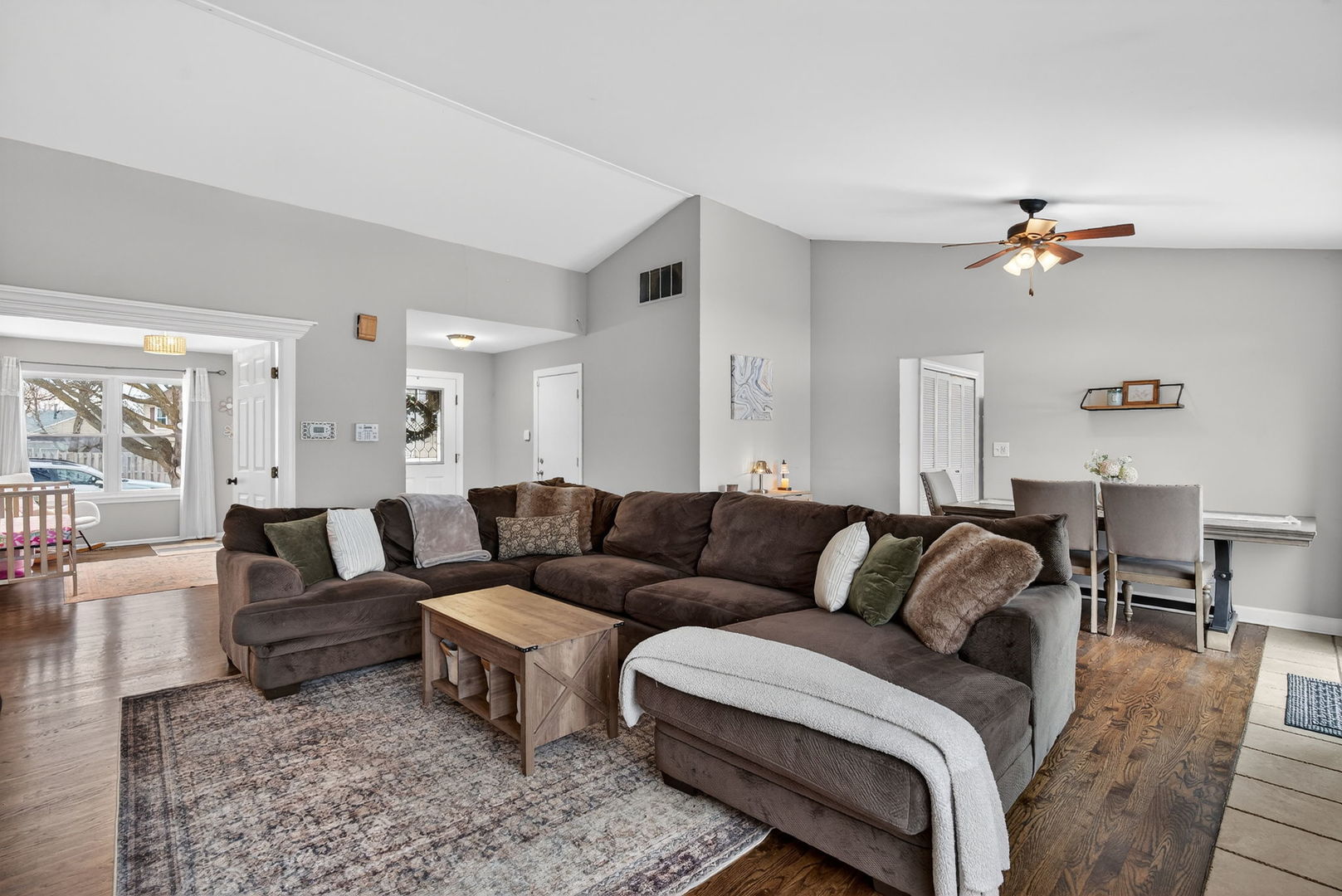 1412 Bar Harbour Road Aurora, IL 60504 - Photo 5 of 38 a living room with furniture and a chandelier