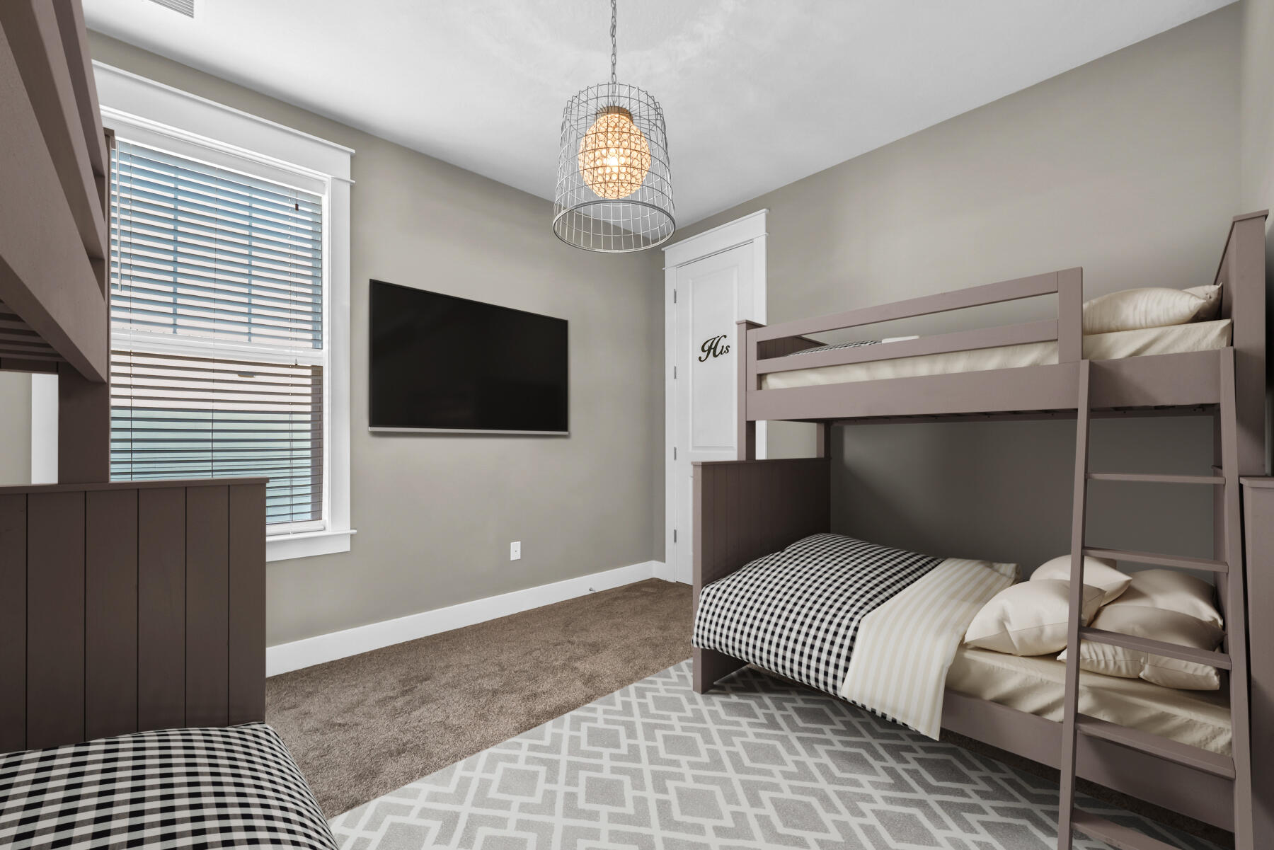 335 Blue Sage Road Panama City Beach, FL 32413 - Photo 23 of 34 a bedroom with a bed and a flat tv screen on dresser