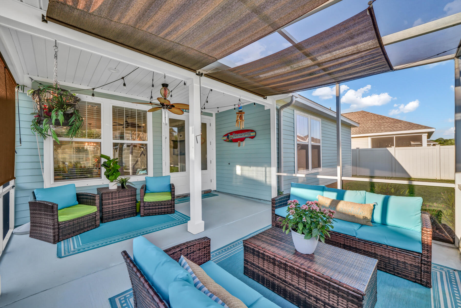 335 Blue Sage Road Panama City Beach, FL 32413 - Photo 28 of 34 a outdoor living space with furniture