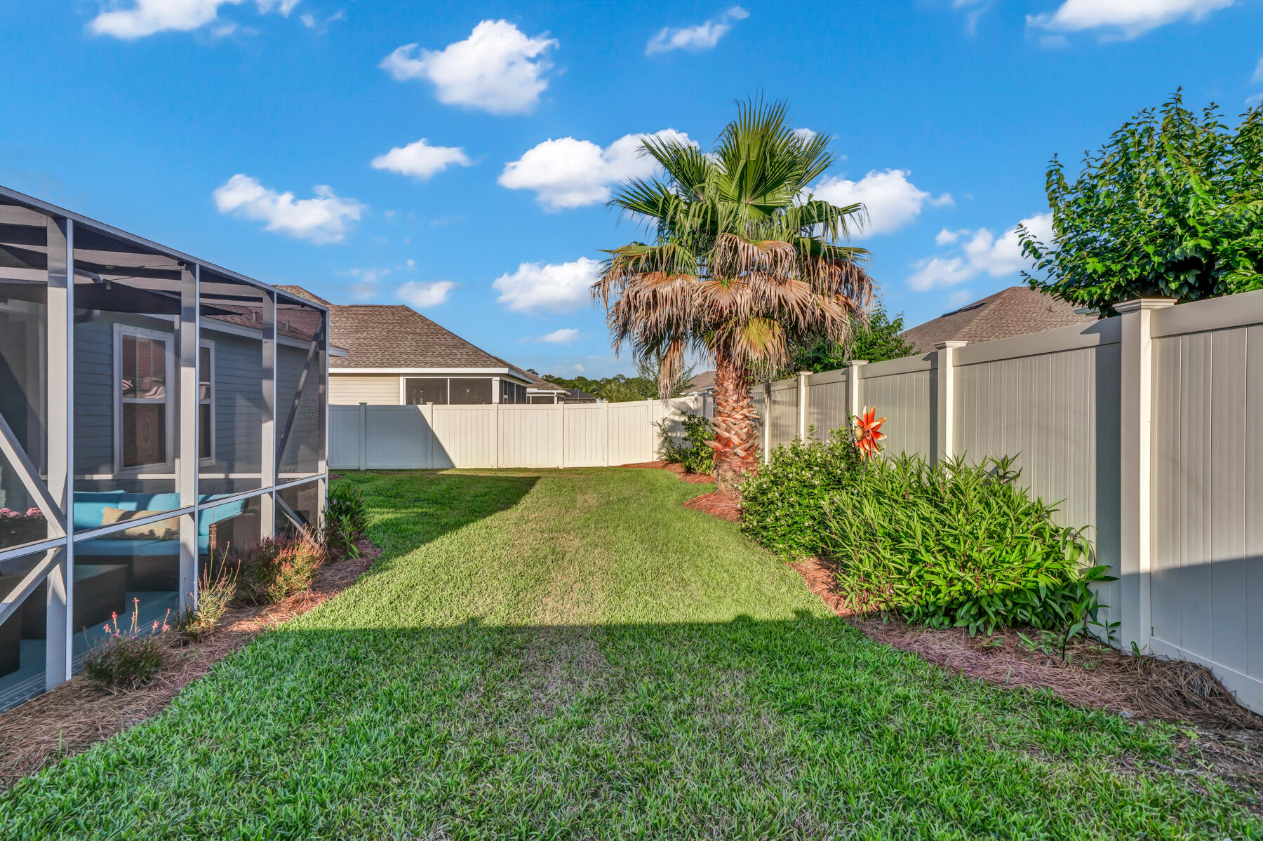 335 Blue Sage Road Panama City Beach, FL 32413 - Photo 30 of 34 a view of back yard of the house