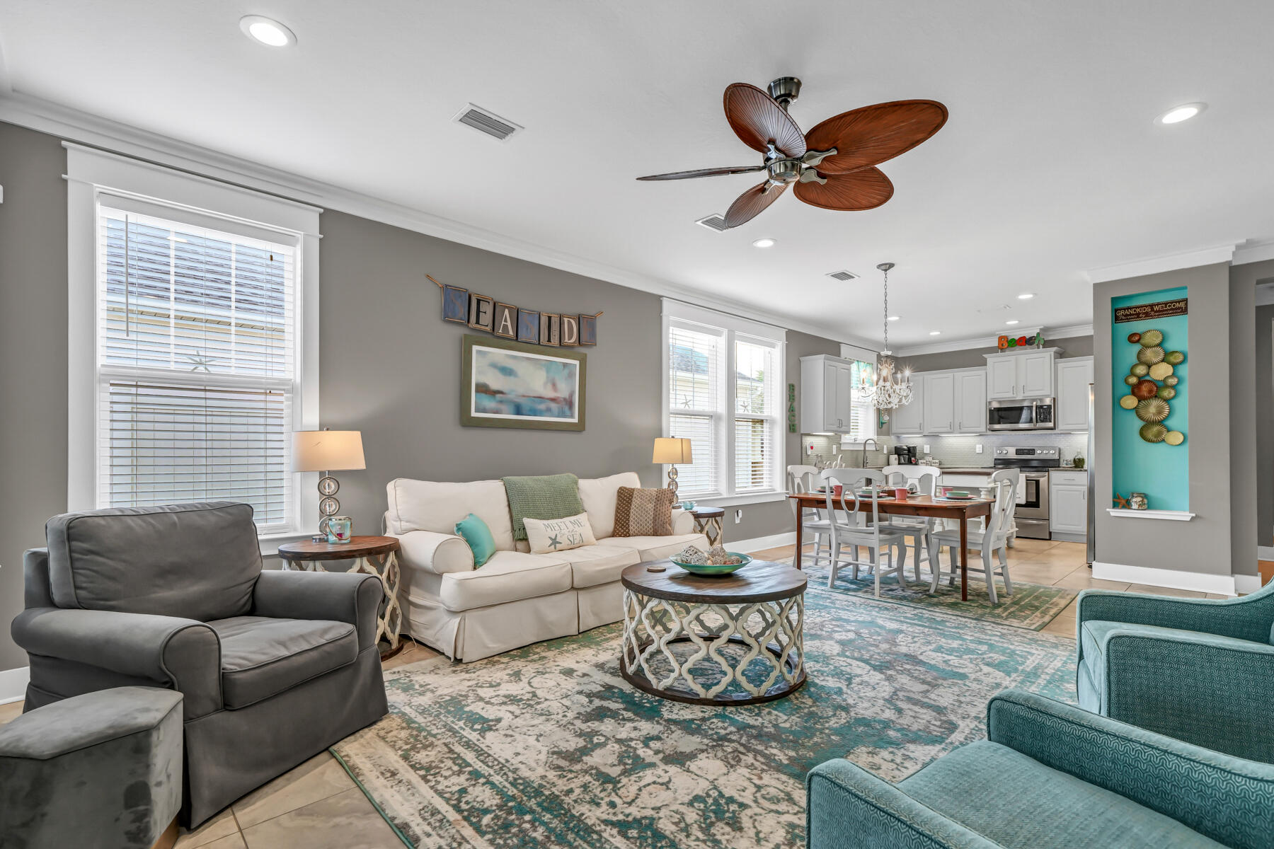 335 Blue Sage Road Panama City Beach, FL 32413 - Photo 10 of 34 a living room with furniture kitchen view and a window