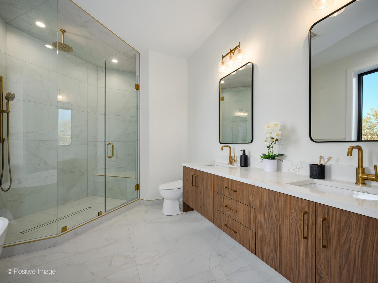 1412 North Elk Grove Avenue, Unit F Chicago, IL 60622 - Photo 18 of 23 a spacious bathroom with double sink a toilet a mirror and shower