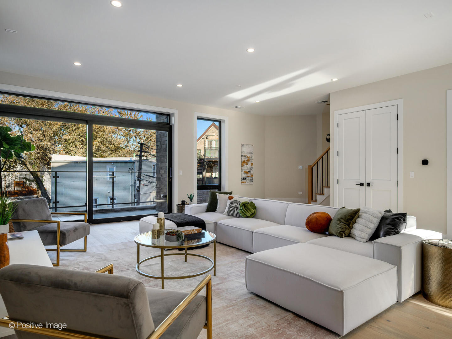 1412 North Elk Grove Avenue, Unit F Chicago, IL 60622 - Photo 4 of 23 a living room with furniture and large windows