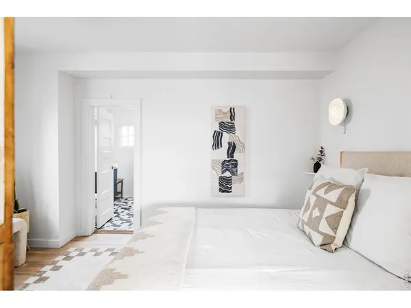 a view of a livingroom with wooden floor