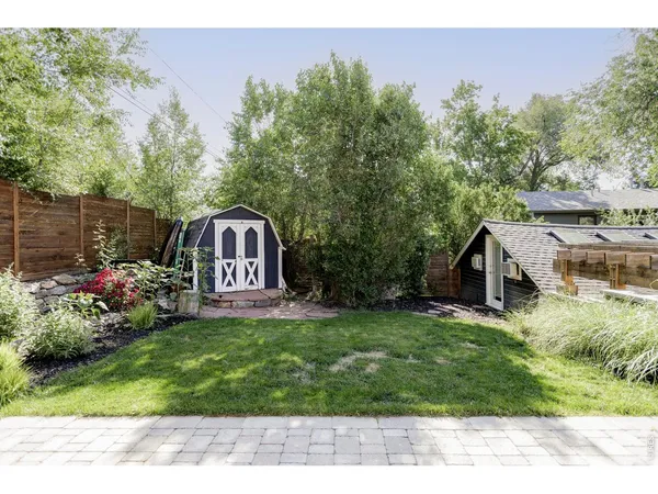 a view of a house with a garden