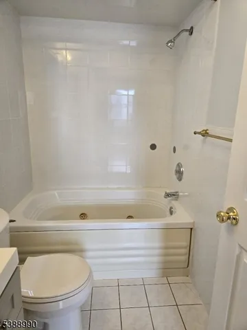 a bathroom with a shower and a toilet