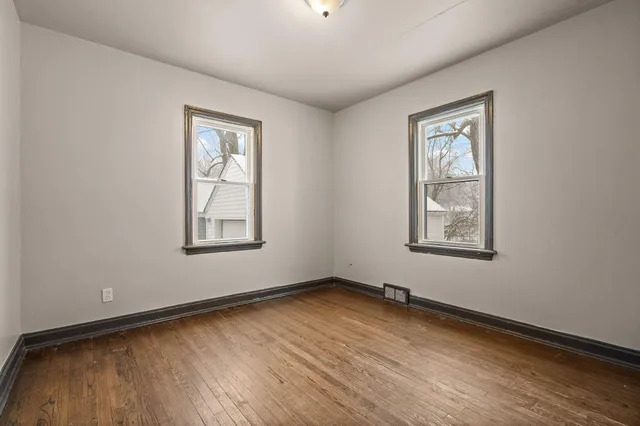 an empty room with windows