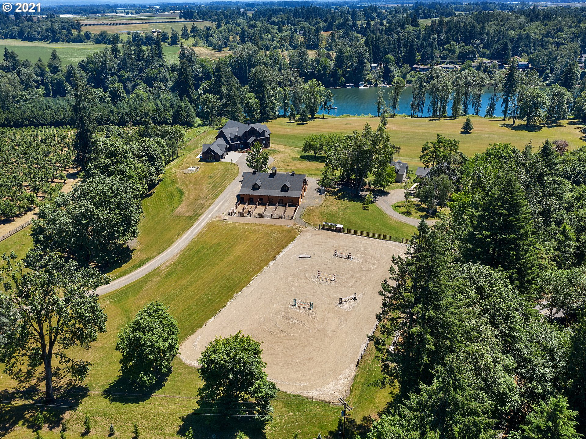 16096 Southwest Wilsonville Road Wilsonville, OR 97070 - Photo 1 of 32 an aerial view of a house with a yard