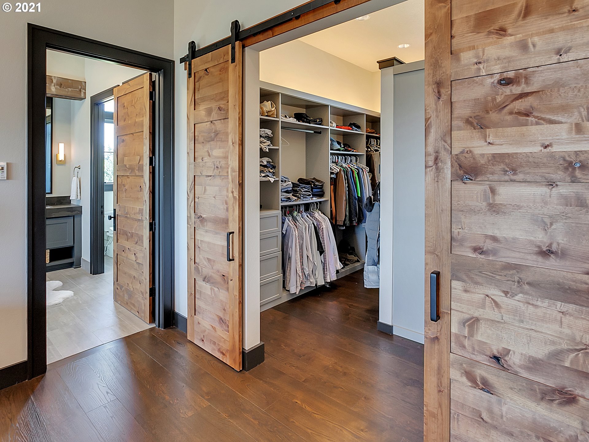 16096 Southwest Wilsonville Road Wilsonville, OR 97070 - Photo 11 of 32 a view of a hallway with wooden floor and a living room