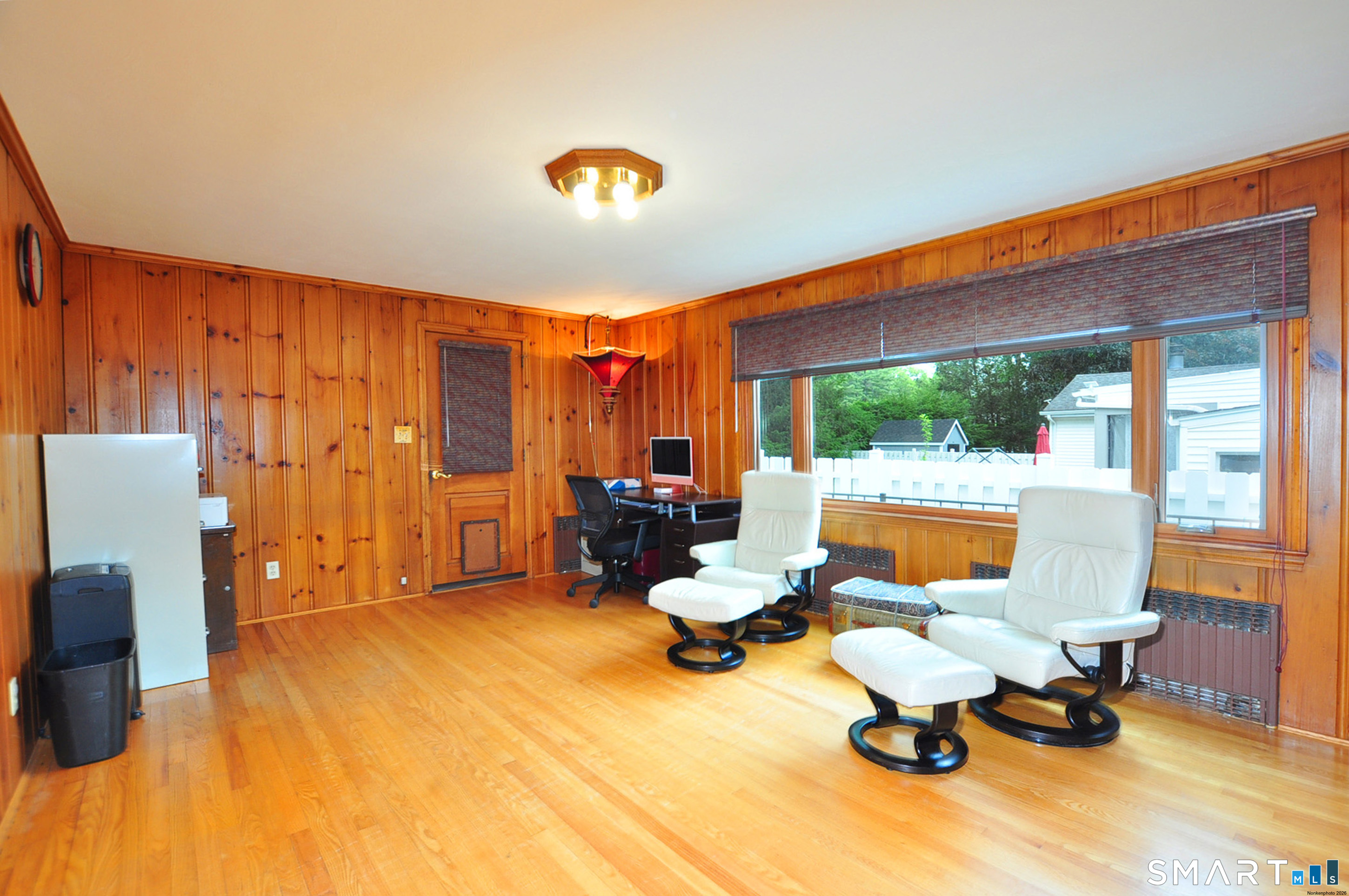 44 Miamis Road West Hartford, CT 06117 - Photo 19 of 39 a view of a livingroom with workspace and a window