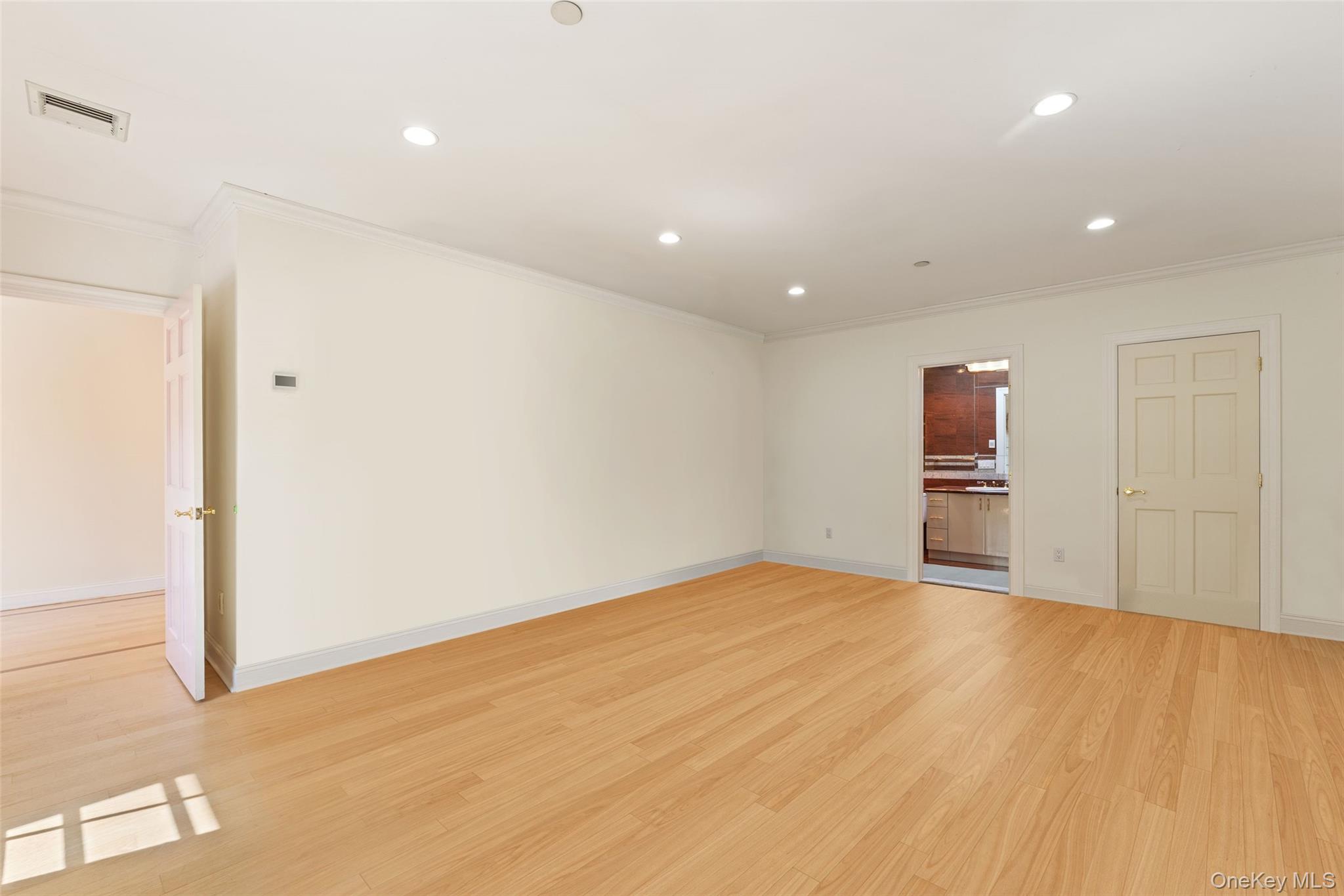 2 High Point Terrace Scarsdale, NY 10583 - Photo 24 of 42 2nd floor bedroom featuring recessed lighting, light wood-style flooring, and crown molding