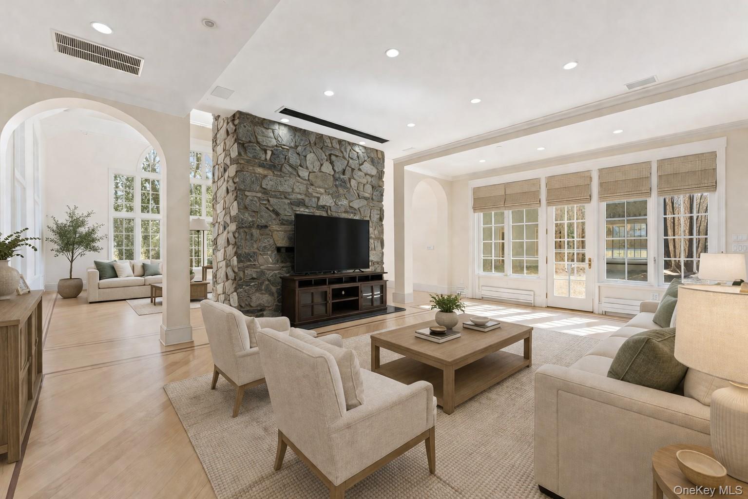 2 High Point Terrace Scarsdale, NY 10583 - Photo 3 of 42 a living room with furniture a flat screen tv and a large window
