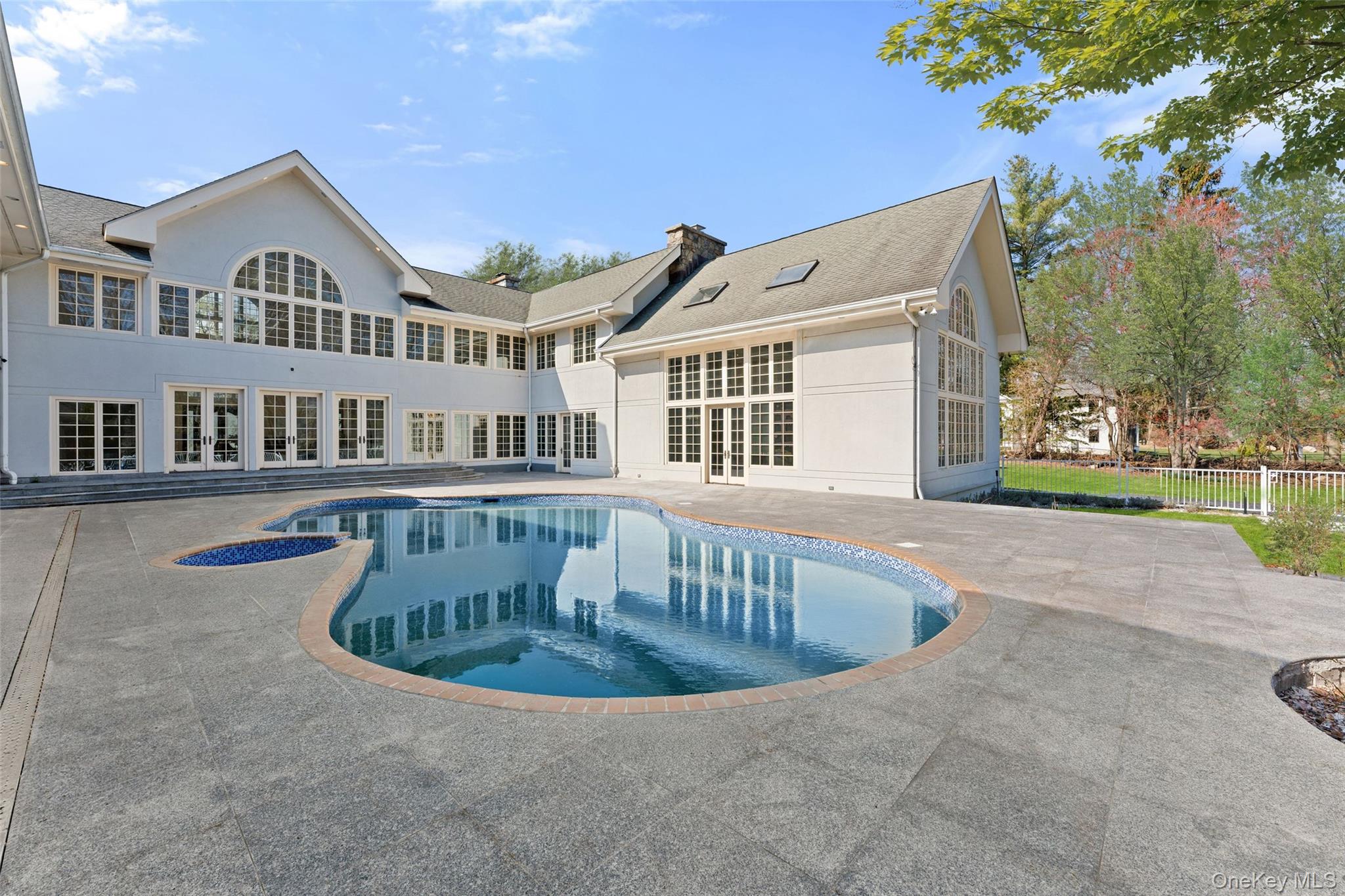 2 High Point Terrace Scarsdale, NY 10583 - Photo 31 of 42 a view of a house with a swimming pool