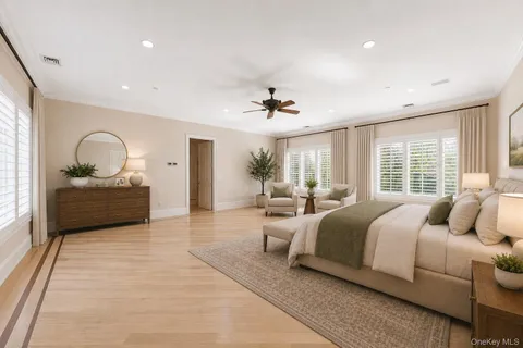a spacious bedroom with a large bed and a couch