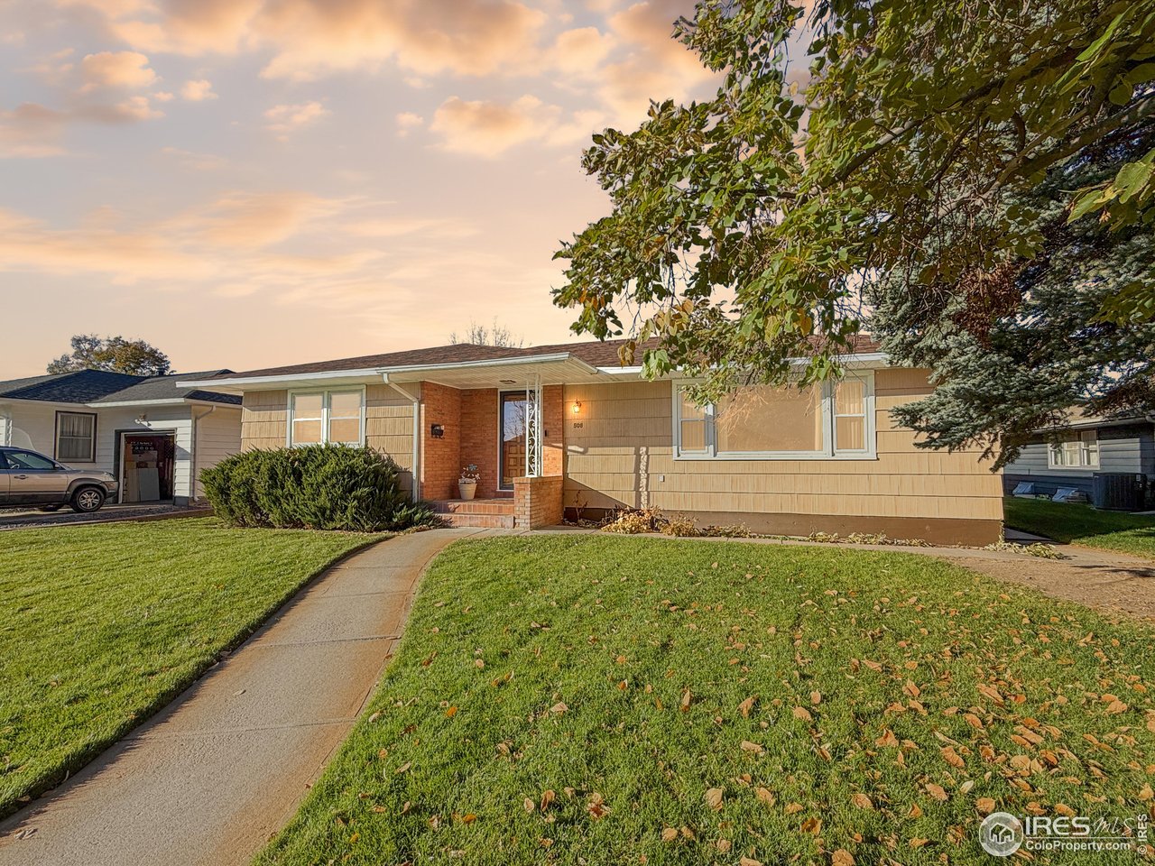 508 Fairhurst Street Sterling, CO 80751 - Photo 1 of 39 a front view of a house with a yard