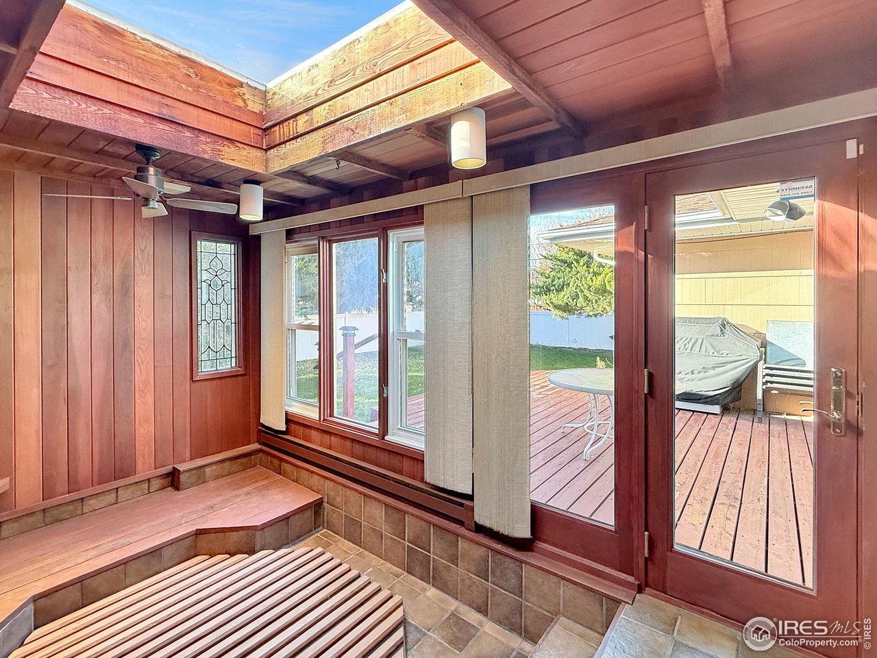 508 Fairhurst Street Sterling, CO 80751 - Photo 22 of 39 a view of a room with wooden floor and furniture