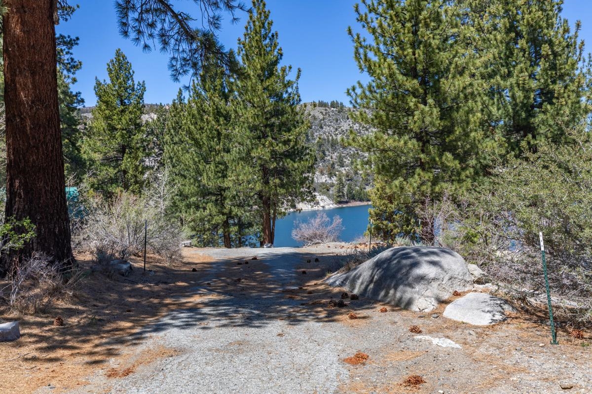 64 Frst Knl Road, Unit 47 June Lake, CA 93529 - Photo 31 of 34 a front view of a house with a yard