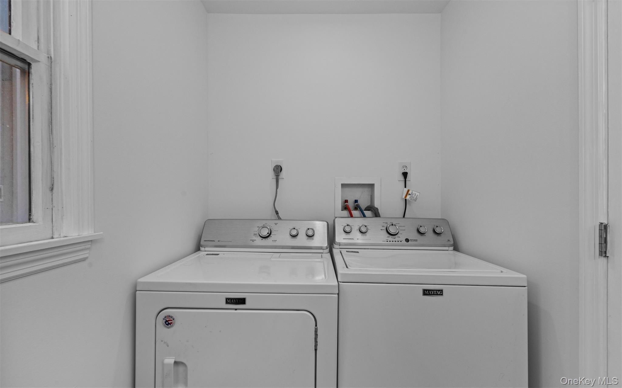 37 Pond Lane Ridge, NY 11961 - Photo 22 of 26 a utility room with dryer and washer