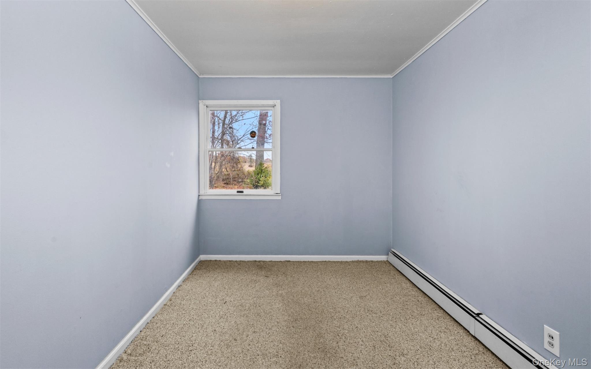 37 Pond Lane Ridge, NY 11961 - Photo 24 of 26 a view of an empty room with a window