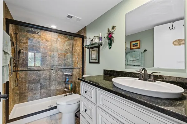 a view of a windows and cabinet with balcony