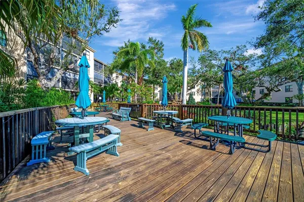 a view of a chairs and table in the terrace