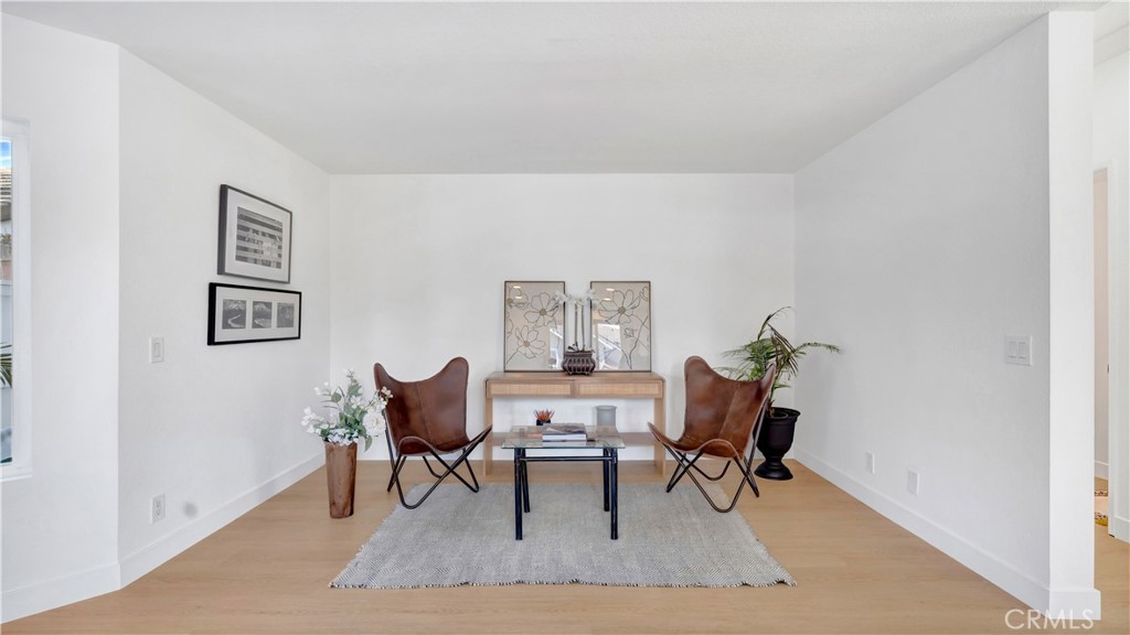 336 Fallingstar Irvine, CA 92614 - Photo 32 of 73 a living room with furniture and a rug