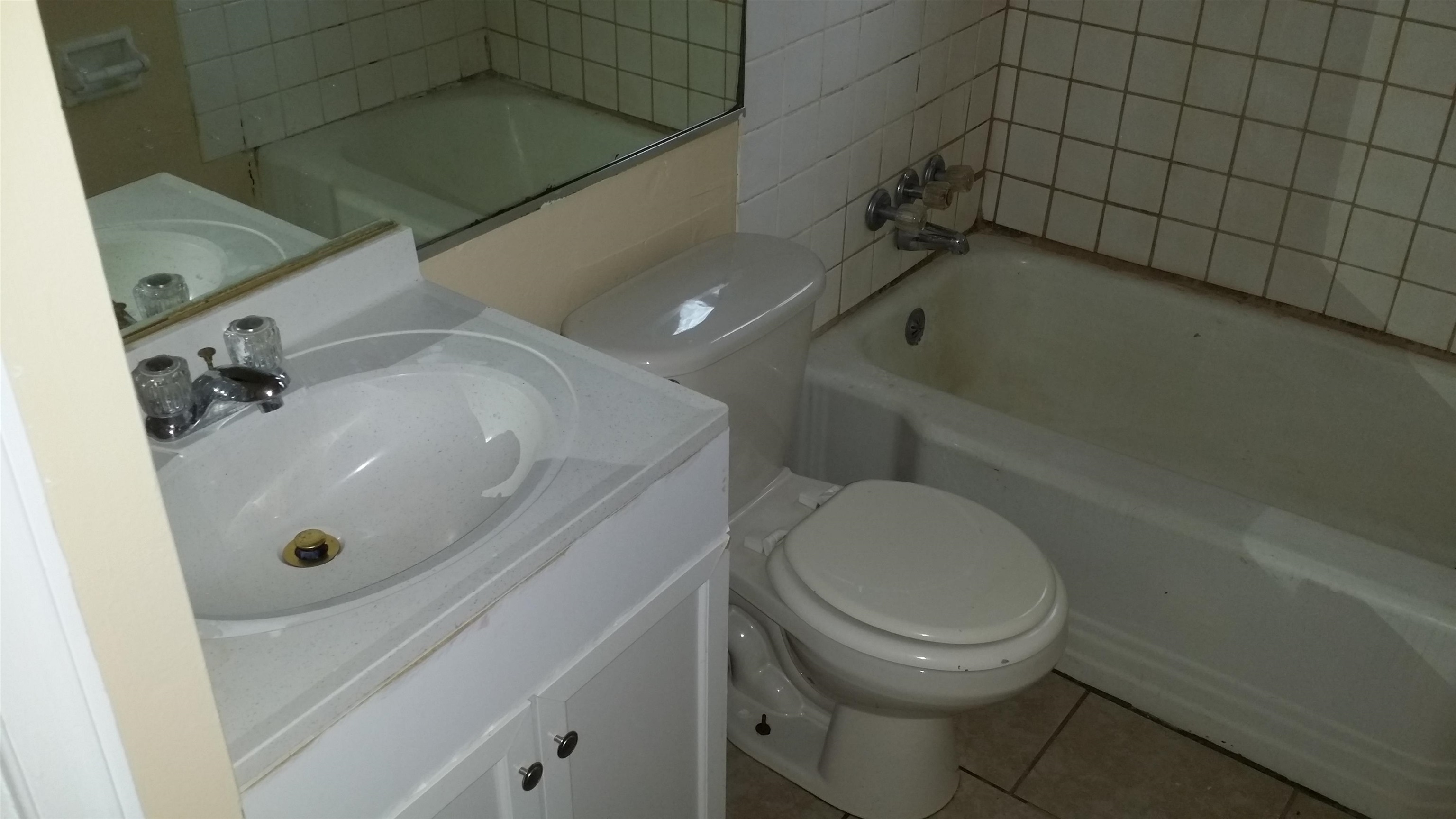 2023 Brighton Road Memphis, TN 38128 - Photo 13 of 21 a bathroom with a sink and a toilet
