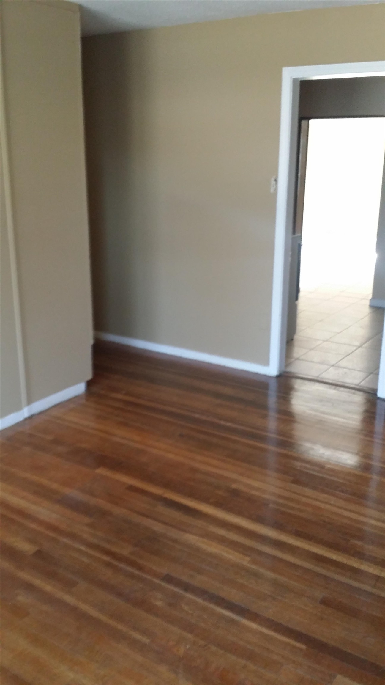 2023 Brighton Road Memphis, TN 38128 - Photo 21 of 21 a view of an empty room with wooden floor