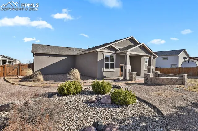 a house view with a outdoor space