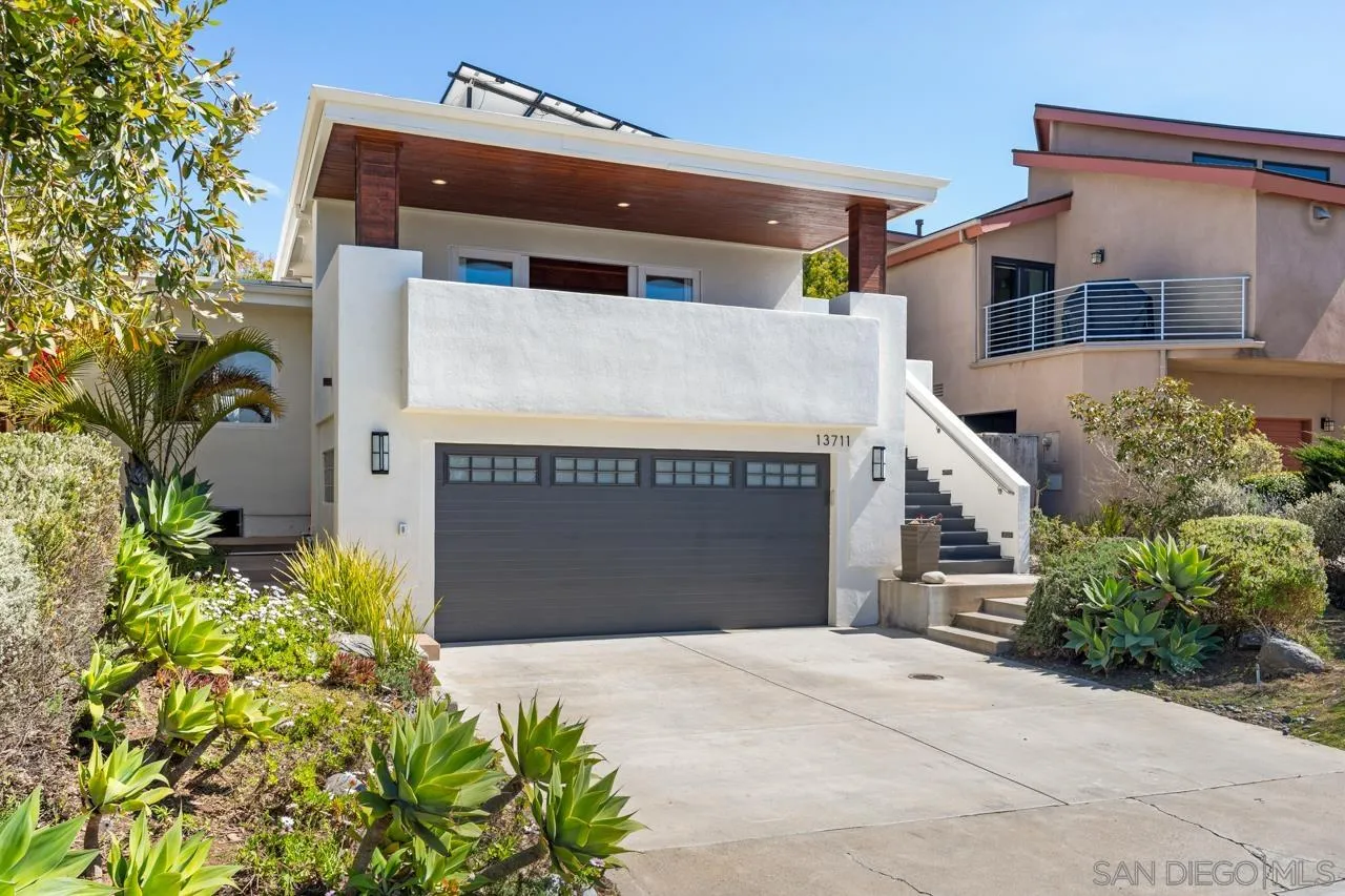 front view of a house with a garage