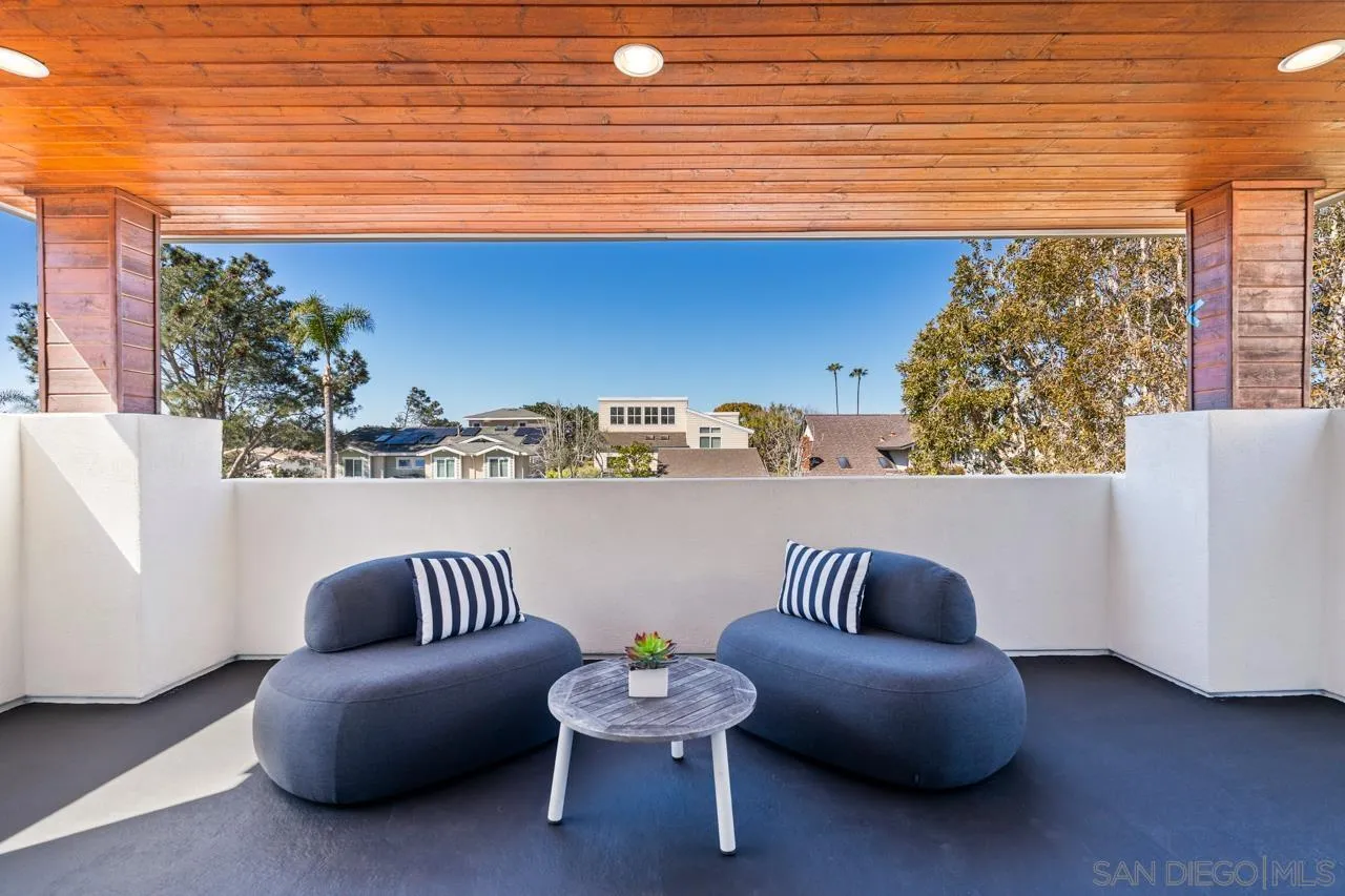 13711 Mercado Drive Del Mar, CA 92014 - Photo 12 of 46 a living room with a couch and a table